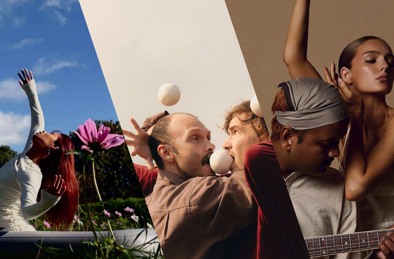 1: Dancer performing an inverted movement inside an inflatable bathtub outdoors 2: Myles Mac Donald and Alex Morton stand face to face with their arms intertwined, performing a dynamic juggling pattern. The two wear autumnal coloured clothing surrounded by Hampstead heaths serene backdrop, at golden hour. There is one juggling ball held between their lips, and two juggling balls in flight between their hands. 3: A female dancer with arms reaching upward, leaning closely to a male guitar player looking towards the guitar frets. They both have their eyes shut taking in the moment.