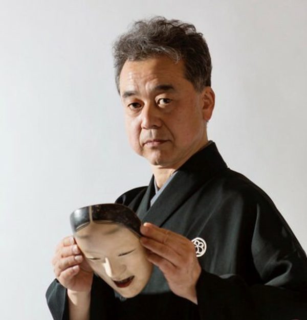 Noboru Sano holding a Noh mash