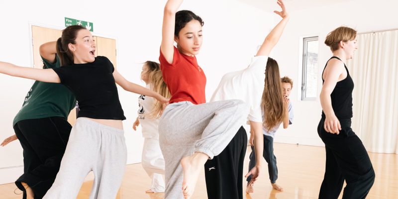 Young dancers aged approximately 13 in a dance studio