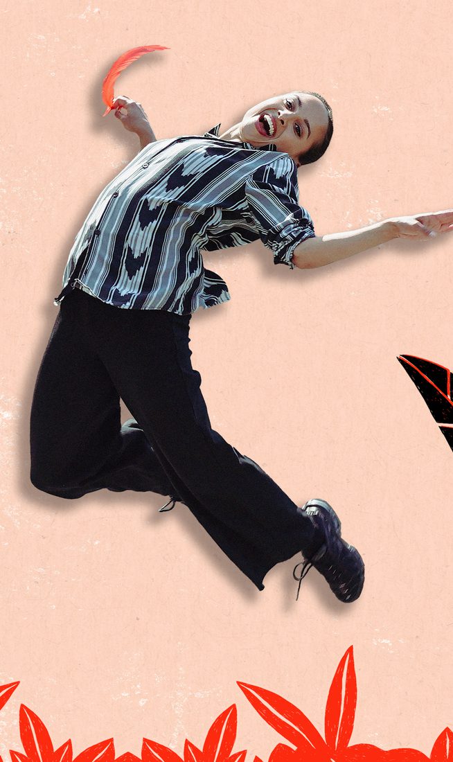 A performer appears mid-jump against an illustrated backdrop of red-and-black plants, with a rooster weather vane and directional arrows on the left side of the image.