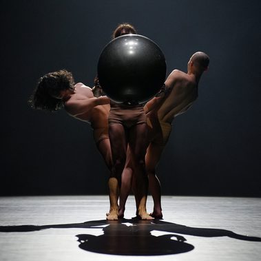 A larger ball appears, and the dancers begin to create relationships with the ball (universe, world) and relationships with other dancers.