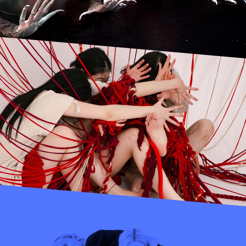 This image is divided into three parts. On the top, two people caught in a prowling motion in a dark theatre setting, wearing skintight grey-and-white costumes with matching caps, makeup, and gloves tipped with long, spiky fingers, evoking lizard-like creatures. In the centre, three people sitting, wearing white tops and short red skirts, stretching their legs and arms forward with fingers spread, caught amid a network of red and white strings cascading from above. On the right, blue-filtered image of two people wearing black tops, one also in grey tracksuit trousers, with one carrying the other on their shoulder and both holding a forward gaze.